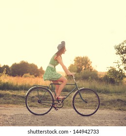 Beautiful Girl On A Vintage Bike