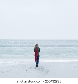 Beautiful Girl On The Winter Beach