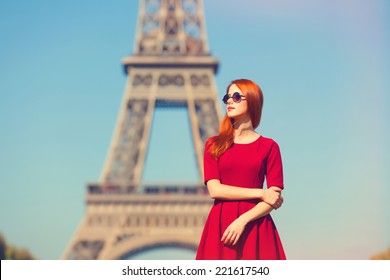 Beautiful Girl In Paris With Eiffel Tower On Background.