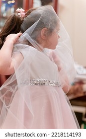 Beautiful Girl Playing With Her Formal Dress While Trying It On