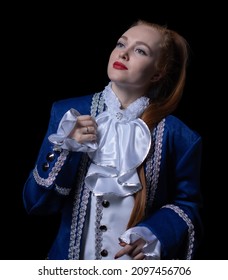 Beautiful Girl Posing In A Butler Costume On A Black Background