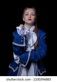 Beautiful Girl Posing In A Butler Costume On A Black Background