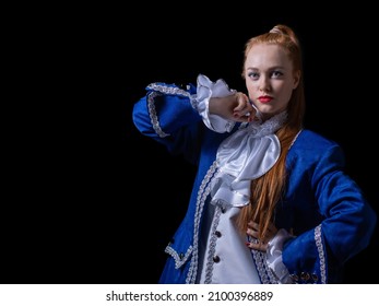 Beautiful Girl Posing In A Butler Costume On A Black Background