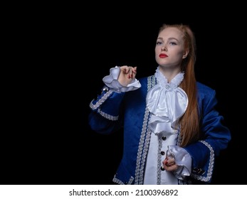 Beautiful Girl Posing In A Butler Costume On A Black Background