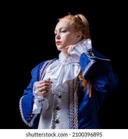 Beautiful Girl Posing In A Butler Costume On A Black Background