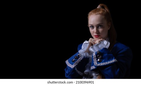 Beautiful Girl Posing In A Butler Costume On A Black Background