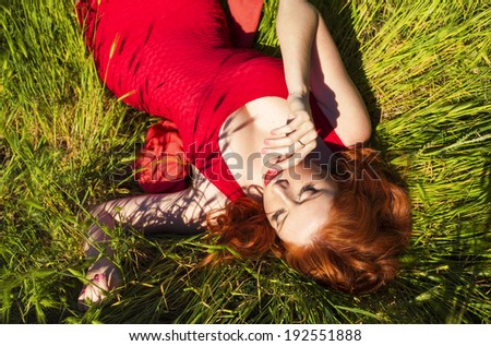 Image, Stock Photo Young redhead woman reading a red book