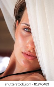 Beautiful Girl Relaxing Outdoor At Summer Lounge Beach Club In Greece