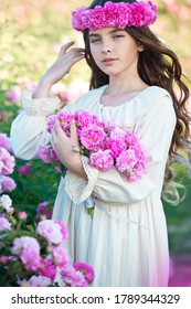 Beautiful Girl In Roses Wreath Collect Roses In Bulgaria In Sunrise. Series.