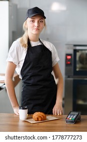 Beautiful Girl Sells Coffee And Pastries