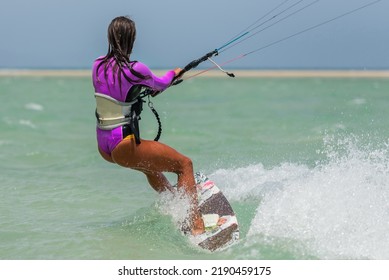 Beautiful Girl, Sexy Woman Kite Surfing Isolated In Fuerteventura, Canary Islands, Spain.