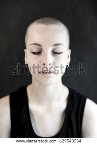 Similar – Image, Stock Photo Portrait of a young, very short-haired woman wearing an off-the-shoulder top through which you can see her nipples