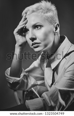 Similar – Image, Stock Photo Portrait of a young, very short-haired woman wearing an off-the-shoulder top through which you can see her nipples