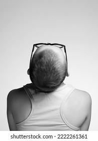 Beautiful Girl With Short Haircut. Back Of Bald Woman In Glasses. Black And White