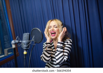 Beautiful Girl Singing In A Recording Studio