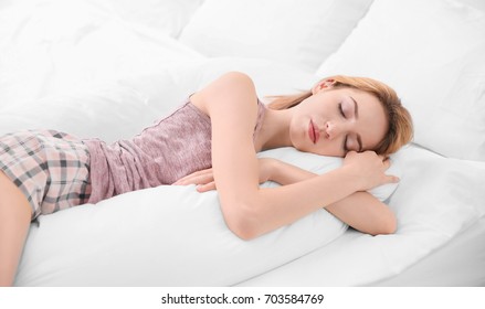 Beautiful Girl Sleeping With Body Pillow In Bedroom