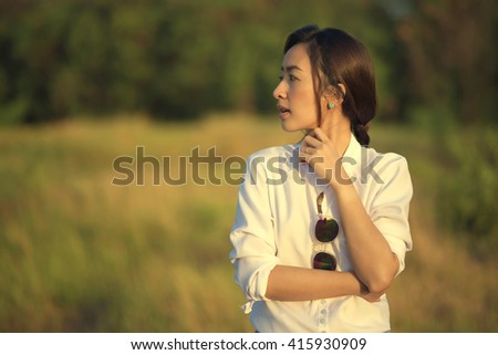 beautiful girl standing in meadow Relaxing Concept 