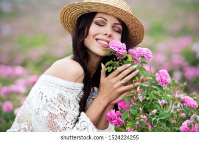 Beautiful Girl In Straw Hat Collect Roses In Bulgaria In Sunrise. Series.