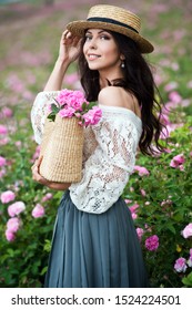 Beautiful Girl In Straw Hat Collect Roses In Bulgaria In Sunrise. Series.