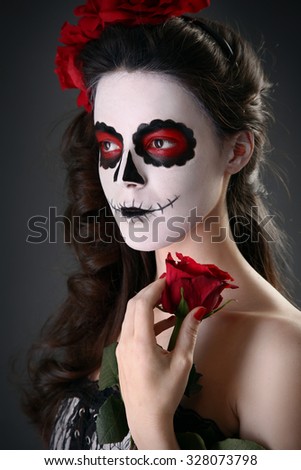 Beautiful girl with sugar skull makeup