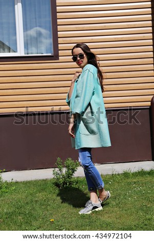 beautiful  girl in summer fashionable clothes