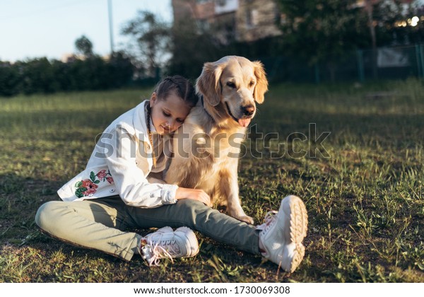 Teen Girl Sitting Pet Dog Outdoors Stock Photo (Edit Now) 449568559