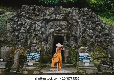 Beautiful girl visiting the goa gajah temple in ubud , Bali. Concept about wanderlust traveling