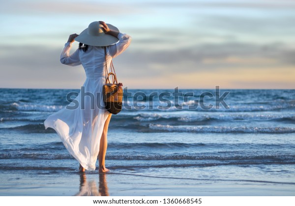 Beautiful Girl Walking On Beach Stock Photo (Edit Now) 1360668545