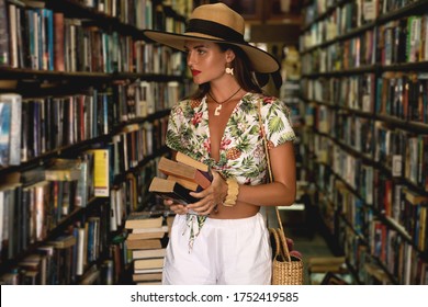 Beautiful Girl Wearing Stylish Outfit Looking For Interesting Book In The Small Vintage Bookstore 