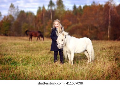 Beautiful Girl With A White Horse With A Mini Forest