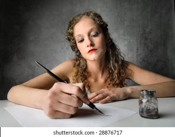 Beautiful Girl Writing A Letter