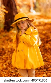 yellow raincoat and hat for adults