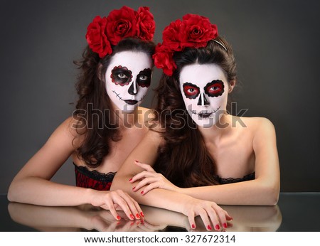 Beautiful girls with sugar skull makeup