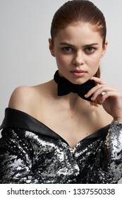 Beautiful Glamor Woman In Silver Lake Bow Tie Butterfly On Her Neck Gray Background