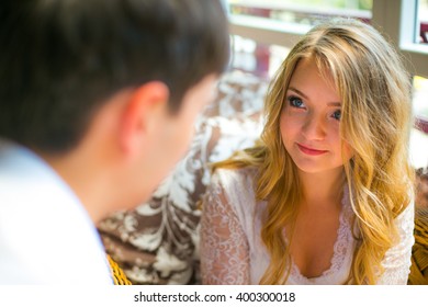 Beautiful glance of the girl on her beloved boy
