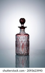 A beautiful glass bottle for perfumery. Bohemian crystal. Close-up. Copyspace