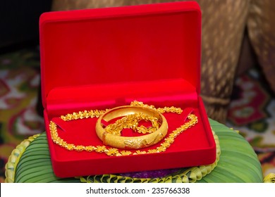 Beautiful gold jewelry in wedding ceremony