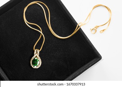 Beautiful Gold Necklace With Emerald And Diamonds In Jewel Box Closeup