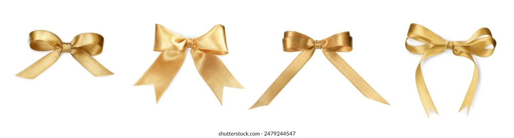 Beautiful golden bows isolated on white, set