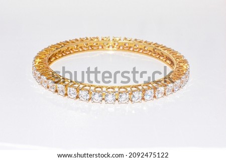 beautiful golden bracelet gemstone gold platinum with diamond bangle isolated on white background