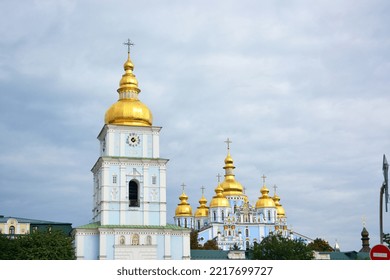 Beautiful Golden Domes Of St. Michael Cathedral In Kyiv, Ukraine. Blue Sky In Background. Space For Copy. 