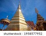 Beautiful golden Pagoda at Wat Phra That Cho Hae is a sacred ancient temple in Phrae, Thailand. Publie Domain.