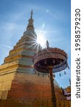 Beautiful golden Pagoda at Wat Phra That Cho Hae is a sacred ancient temple in Phrae, Thailand. Publie Domain.