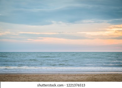 Beautiful golden sunset with blue sky over the horizon on the beach, Thailand. The coastal scene along the coast over the horizon on the ocean background. Tropical landscape summer sea concept. - Powered by Shutterstock