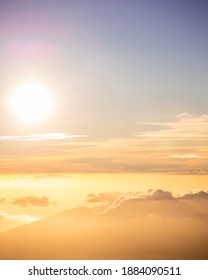 Beautiful Golden Sunset From Mount Haleakala Hawaii