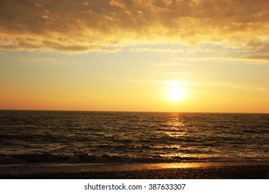 Beautiful Golden Sunset over sea - Shutterstock ID 387633307