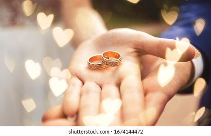 Beautiful Golden Wedding Ring In Hands