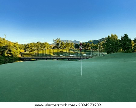 Beautiful golf hole with bridge and mountain view good for golfer house decore