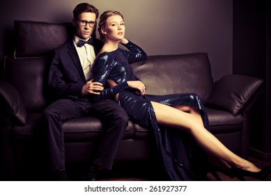 Beautiful Gorgeous Couple In Elegant Evening Dresses. Fashion, Glamour.