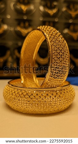 A beautiful and gorgeous gold bangles  for women. Gold color fashionable bangles. 22k gold bangles for all class of women.